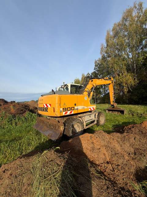Riteņu ekskavators Liebherr A900 Litronic, ar lāpstu, 16 392 motorstundas